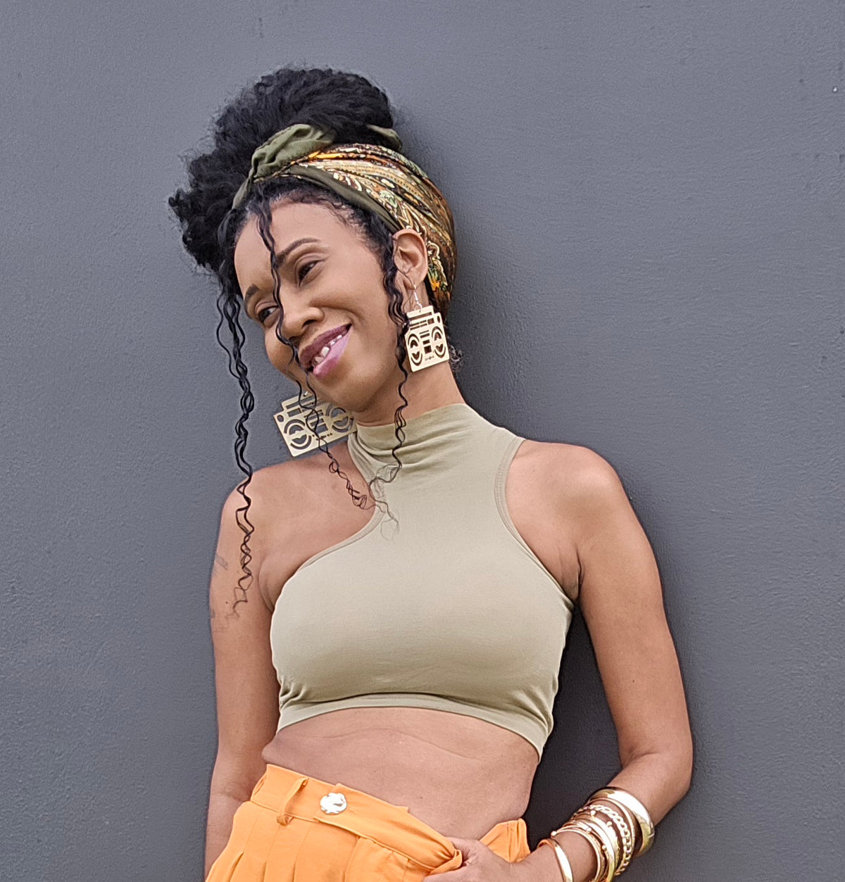 Soulhemian founder Trini wearing an urban boho outfit with statement accessories